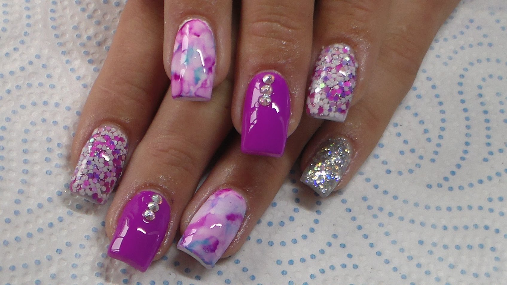 7. Pink and Purple Marble Nails - wide 8